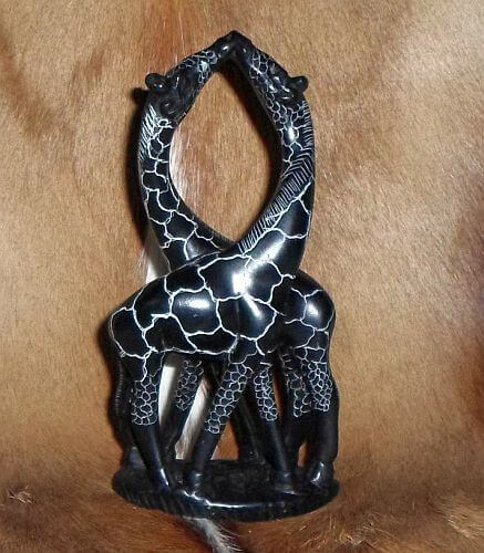 African stone giraffe couple African stone loving giraffes